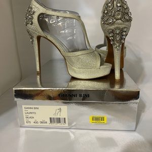 T strap silver shoes